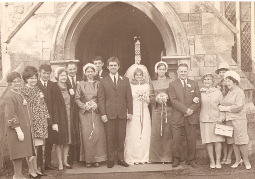 My parents wedding photograph, with my aunty christine in the leapoard coat, nana and great nana